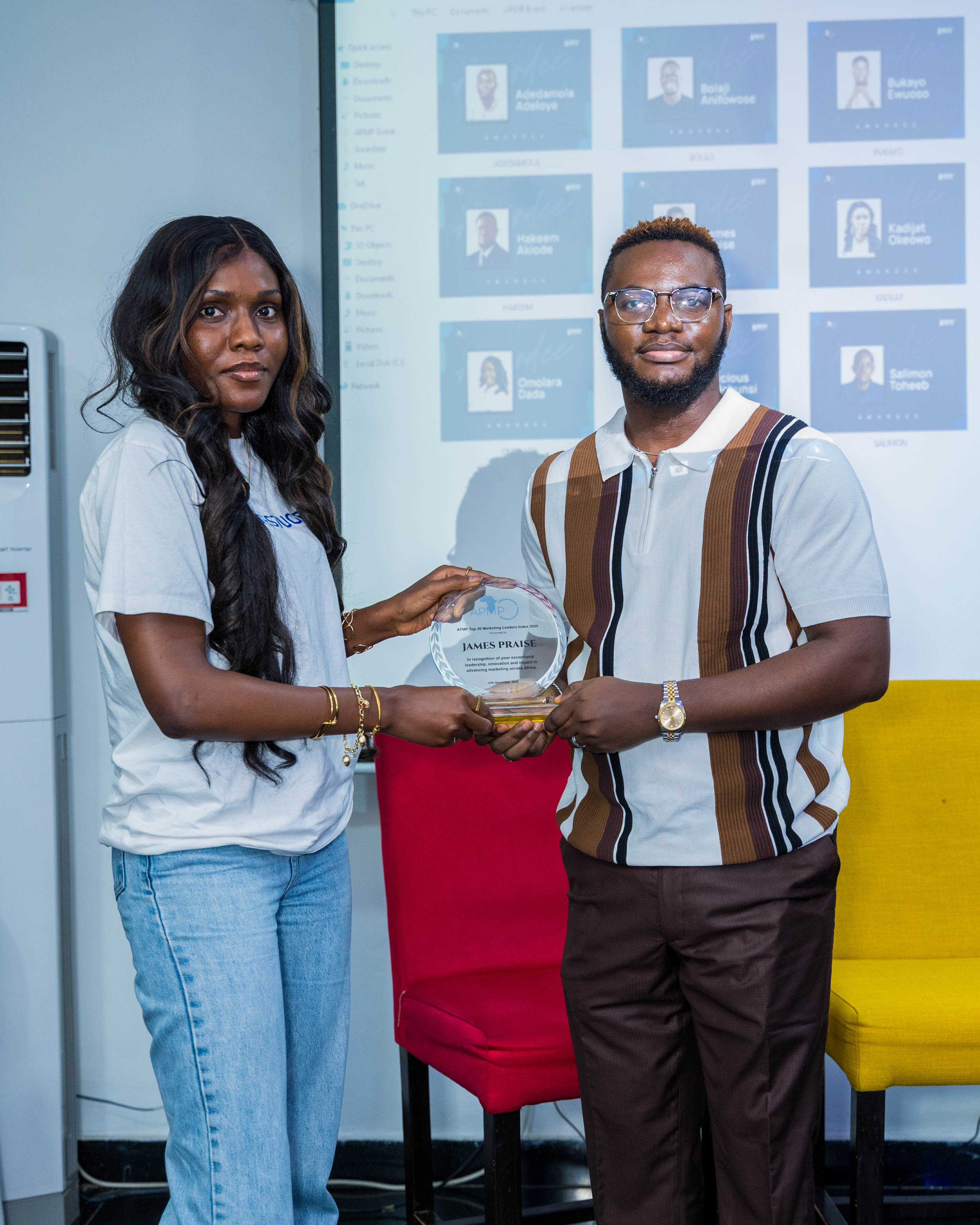 James Praise receiving award